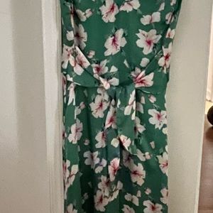 Worn one time to a wedding as guest.  Received compliments on the dress!